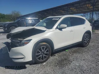 2018 Mazda CX-5 Grand Touring z VIN JM3KFBDM7J0377031, wystawiony jako Copart lot #52530205 z przebiegiem 150 479 mil mil oraz Szkoda całkowita • Salvage title. Historia ofert i sprzedaży dostępna na DreamBid. Obrazek 1.