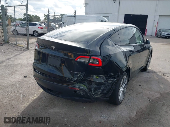 2023 Tesla Model Y Long Range with VIN 7SAYGDEE2PA044328, listed as a IAAI auction lot 42427625 with 41,324 mi miles and . Bid and sale history available at DreamBid. Image 6.