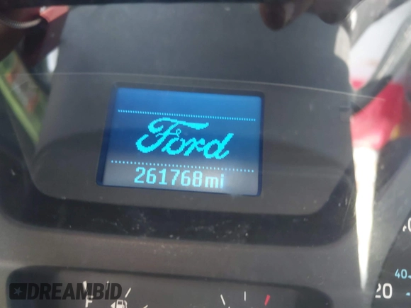 2015 Ford Transit Cargo with VIN 1FTNR1ZM9FKA56829, listed as a IAAI auction lot 42016014 with 261,768 mi miles. Bid and sale history available at carsss.com. Image 7.