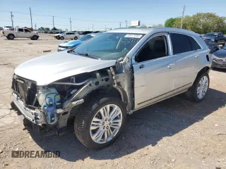 2019 Cadillac XT5 Premium Luxury AWD with VIN 1GYKNFRS6KZ233259, listed as a Copart auction lot 53647695 with 128,534 mi miles and Salvage title. Bid and sale history available at DreamBid. Image 1.