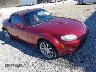 2006 Mazda MX-5 Miata Touring with VIN JM1NC25F760121414, listed as a IAAI auction lot 41856055 with 112,933 mi miles and . Bid and sale history available at DreamBid. Image 1.