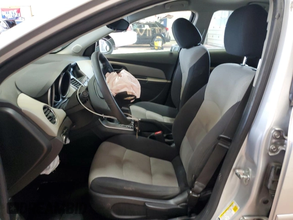 2015 Chevrolet Cruze LS with VIN 1G1PA5SG0F7185162, listed as a Copart auction lot 57080495 with 63,811 mi miles and Salvage Title. Bid and sale history available at DreamBid. Image 7.