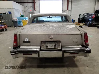 1984 Cadillac Eldorado z VIN 1G6AL5785EE630873, wystawiony jako Copart lot #82896404 z przebiegiem 3 839 mil mil oraz Czysty tytuł • Clean title. Historia ofert i sprzedaży dostępna na DreamBid. Obrazek 6.