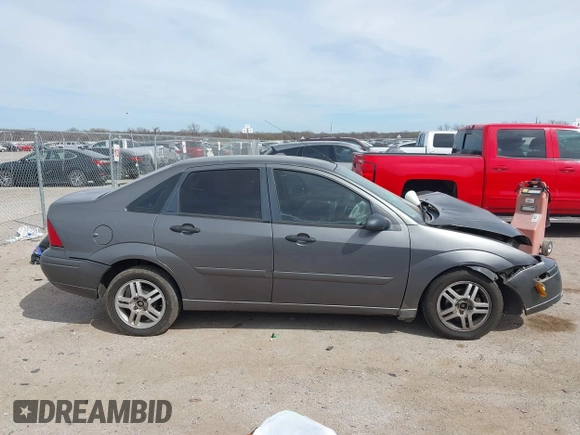 2004 Ford Focus ZTS with VIN 1FAFP38Z94W165483, listed as a IAAI auction lot 41775001 with 222,589 mi miles and . Bid and sale history available at carsss.com. Image 13.