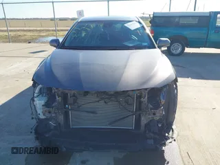 2021 Toyota Camry SE Nightshade with VIN 4T1T11AK8MU589941, listed as a IAAI auction lot 41651556 with 110,283 mi miles and . Bid and sale history available at DreamBid. Image 6.