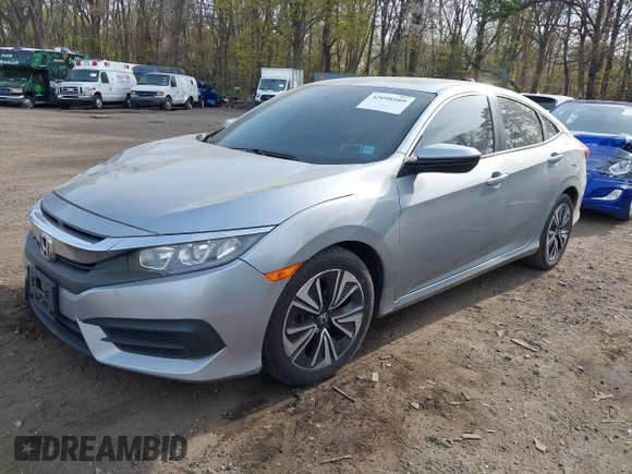 2018 Honda Civic Sedan LX with VIN 2HGFC2F5XJH573938, listed as a IAAI auction lot 42098109 with 69,037 mi miles. Bid and sale history available at carsss.com. Image 18.
