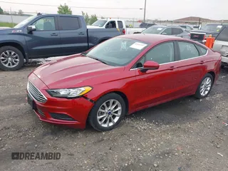 2017 Ford Fusion SE with VIN 3FA6P0H75HR221571, listed as a IAAI auction lot 42452297 with 91,354 mi miles and . Bid and sale history available at DreamBid. Image 2.
