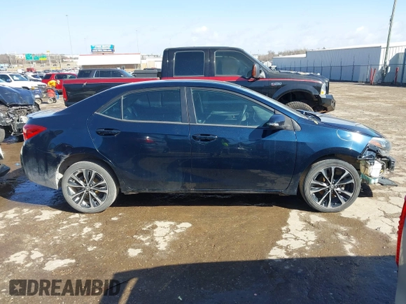2017 Toyota Corolla L z VIN 5YFBURHE0HP721258, wystawiony jako IAAI lot #41706824 z przebiegiem 158 554 mil mil oraz . Historia ofert i sprzedaży dostępna na DreamBid. Obrazek 14.