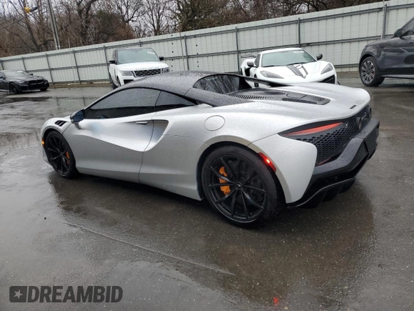 2023 McLaren Artura z VIN SBM16AEA4PW001953, wystawiony jako Copart lot #88790405 z przebiegiem 6864 mil mil oraz Nie do naprawy. Historia ofert i sprzedaży dostępna na DreamBid. Obrazek 2.