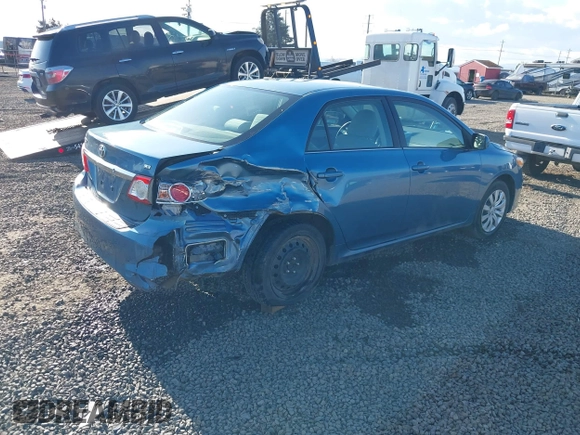 2013 Toyota Corolla L with VIN 5YFBU4EE2DP127014, listed as a IAAI auction lot 41729189 with 156,673 mi miles. Bid and sale history available at carsss.com. Image 4.