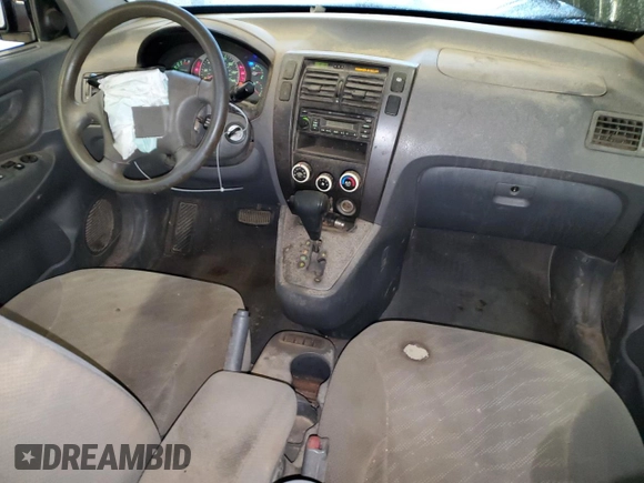 2005 Hyundai Tucson GL with VIN KM8JM12BX5U205060, listed as a Copart auction lot 71282644 with 243,076 mi miles and Salvage Title. Bid and sale history available at carsss.com. Image 8.