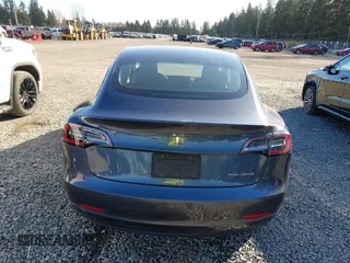 2020 Tesla Model 3 Long Range with VIN 5YJ3E1EB6LF647510, listed as a IAAI auction lot 41692902 with 69,736 mi miles. Bid and sale history available at carsss.com. Image 17.