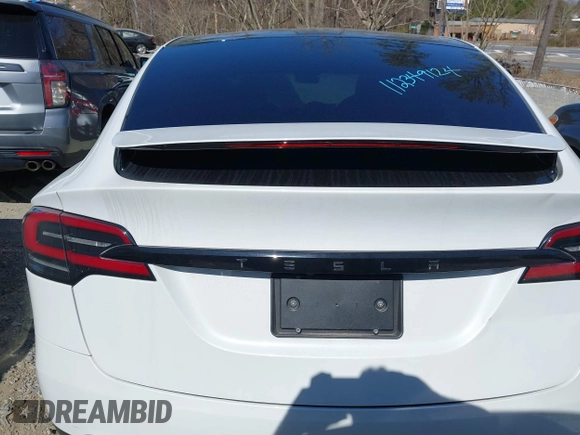 2023 Tesla Model X with VIN 7SAXCDE54PF430808, listed as a IAAI auction lot 41667924 with 21,100 mi miles and . Bid and sale history available at DreamBid. Image 16.