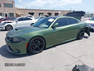 2021 Dodge Charger R/T with VIN 2C3CDXCT0MH652199, listed as a IAAI auction lot 42051678 with 11,798 mi miles and . Bid and sale history available at carsss.com. Image 2.