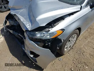 2019 Ford Fusion S with VIN 3FA6P0G71KR275393, listed as a IAAI auction lot 41827288 with 108,160 mi miles and . Bid and sale history available at DreamBid. Image 18.