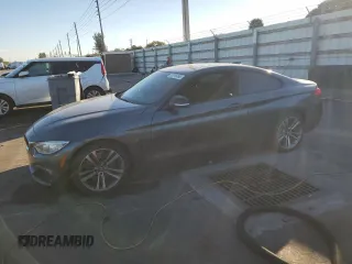 2015 BMW 4 Series 435i with VIN WBA3R1C53FK193674, listed as a Copart auction lot 87815465 with 60,286 mi miles and Salvage Title. Bid and sale history available at carsss.com. Image 1.