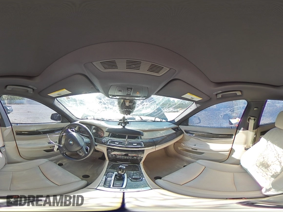 2013 BMW 7 Series 750Li xDrive with VIN WBAYF8C57DD140694, listed as a Copart auction lot 56983435 with 113,444 mi miles and Salvage title. Bid and sale history available at DreamBid. Image 14.
