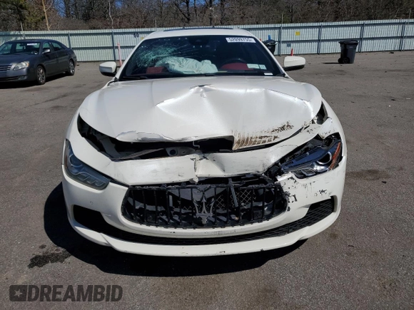 2017 Maserati Ghibli S Q4 z VIN ZAM57RTA6H1247079, wystawiony jako Copart lot #52099755 z przebiegiem 124 159 mil mil oraz Szkody całkowita. Historia ofert i sprzedaży dostępna na DreamBid. Obrazek 5.