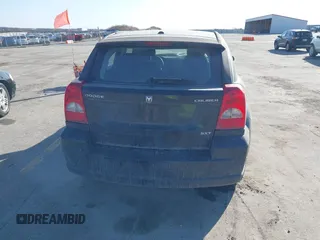 2010 Dodge Caliber SXT with VIN 1B3CB4HA4AD651946, listed as a IAAI auction lot 41771139 with 165,663 mi miles and . Bid and sale history available at DreamBid. Image 17.