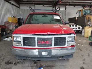 1993 GMC Sierra 1500 z VIN 1GTEK14H0PE542993, wystawiony jako IAAI lot #41833743 z przebiegiem 225 085 mil mil oraz . Historia ofert i sprzedaży dostępna na DreamBid. Obrazek 12.
