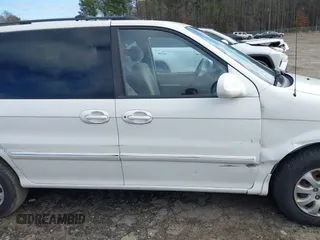 2005 Kia Sedona LX with VIN KNDUP132356708456, listed as a IAAI auction lot 41220936 with 172,960 mi miles. Bid and sale history available at carsss.com. Image 13.