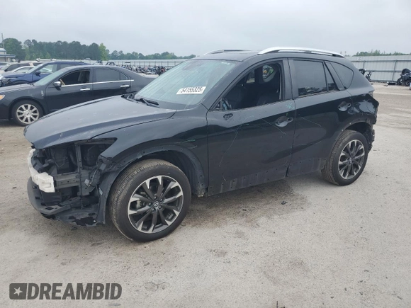 2016 Mazda CX-5 Grand Touring z VIN JM3KE2DY5G0676290, wystawiony jako Copart lot #54155325 z przebiegiem 124 743 mil mil oraz Szkoda całkowita • Salvage title. Historia ofert i sprzedaży dostępna na DreamBid. Obrazek 1.