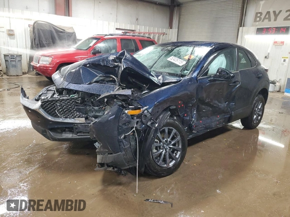 2023 Mazda CX-30 S with VIN 3MVDMBAM1PM565897, listed as a Copart auction lot 52426115 with 19,648 mi miles and Salvage title. Bid and sale history available at DreamBid. Image 1.