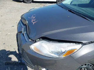 2012 Ford Focus SE with VIN 1FAHP3F27CL276208, listed as a IAAI auction lot 41995770 with 98,004 mi miles. Bid and sale history available at carsss.com. Image 14.