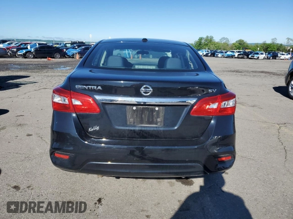 2018 Nissan Sentra S with VIN 3N1AB7AP4JY348669, listed as a Copart auction lot 55848195 with 50,700 mi miles and Salvage Title. Bid and sale history available at DreamBid. Image 6.