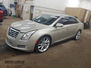 2013 Cadillac XTS Luxury with VIN 2G61R5S39D9222856, listed as a Copart auction lot 47527595 with 147,842 mi miles and Salvage Title. Bid and sale history available at carsss.com. Image 1.