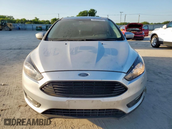 2018 Ford Focus SE z VIN 1FADP3F2XJL277462, wystawiony jako Copart lot #60360985 z przebiegiem 81 831 mil mil oraz Czysty tytuł • Clean title. Historia ofert i sprzedaży dostępna na DreamBid. Obrazek 5.