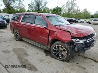 2023 Chevrolet Suburban LS with VIN 1GNSKBKD3PR122105, listed as a Copart auction lot 54889545 with 70,921 mi miles and Salvage title. Bid and sale history available at DreamBid. Image 4.