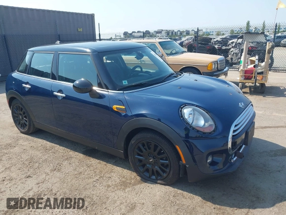2015 MINI Hardtop 4 Door with VIN WMWXS5C50FT830060, listed as a IAAI auction lot 42744826 with 99,813 mi miles and . Bid and sale history available at DreamBid. Image 1.