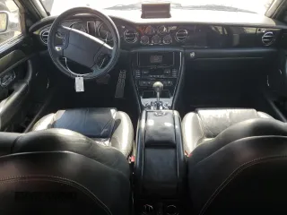 2004 Bentley Arnage z VIN SCBLF34F44CX09923, wystawiony jako Copart lot #52712015 z przebiegiem Nie podano mil oraz Tytuł czysty. Historia ofert i sprzedaży dostępna na DreamBid. Obrazek 8.