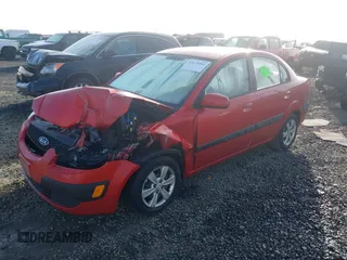 2009 Kia Rio LX with VIN KNADE223796485606, listed as a IAAI auction lot 41676881 with 58,852 mi miles and . Bid and sale history available at DreamBid. Image 17.