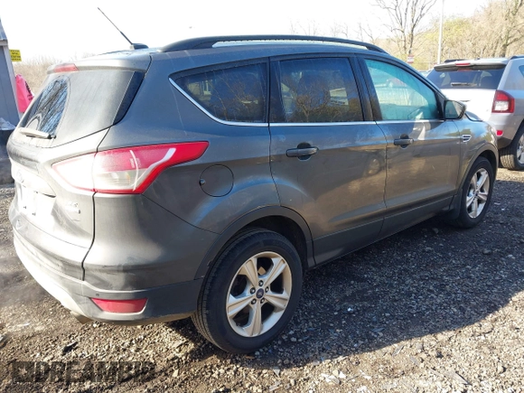 2015 Ford Escape SE with VIN 1FMCU9GX6FUB35649, listed as a IAAI auction lot 42055398 with 128,524 mi miles. Bid and sale history available at carsss.com. Image 4.