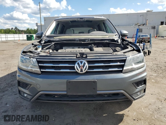 2018 Volkswagen Tiguan SEL с VIN 3VV2B7AXXJM046085, выставлен на аукционе Copart как лот 55147435 с пробегом 79 372 миль миль и Списание • Salvage title. История ставок и продаж доступна на DreamBid. Изображение 5.