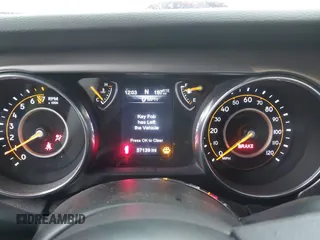 2020 Jeep Wrangler Sport S z VIN 1C4GJXAG8LW266464, wystawiony jako IAAI lot #41958375 z przebiegiem 57 139 mil mil oraz . Historia ofert i sprzedaży dostępna na DreamBid. Obrazek 7.