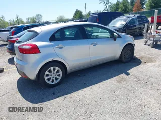 2013 Kia Rio LX with VIN KNADM5A33D6307061, listed as a IAAI auction lot 42143985 with 66,621 mi miles and . Bid and sale history available at DreamBid. Image 4.