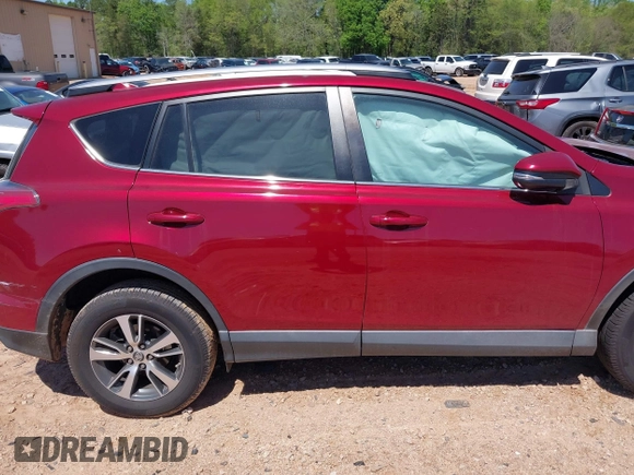 2018 Toyota RAV4 XLE with VIN 2T3WFREVXJW434957, listed as a IAAI auction lot 42002561 with 111,590 mi miles and . Bid and sale history available at carsss.com. Image 13.