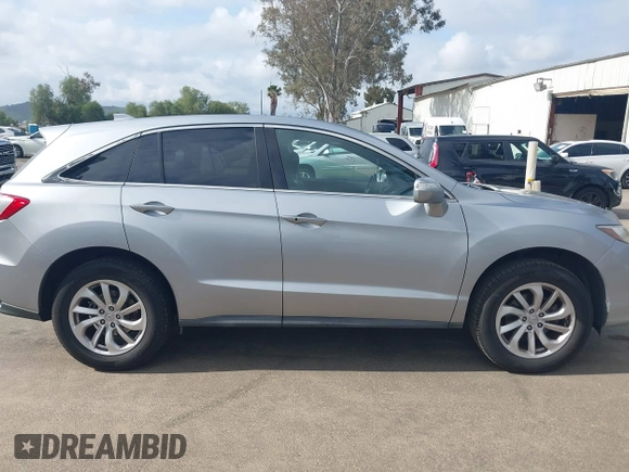 2017 Acura RDX with VIN 5J8TB3H32HL019765, listed as a IAAI auction lot 41935355 with 128,704 mi miles. Bid and sale history available at carsss.com. Image 13.