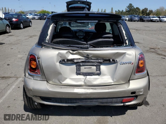 2009 MINI Hardtop S with VIN WMWMF73549TT94143, listed as a Copart auction lot 52120615 with 144,334 mi miles and Salvage Title. Bid and sale history available at DreamBid. Image 6.