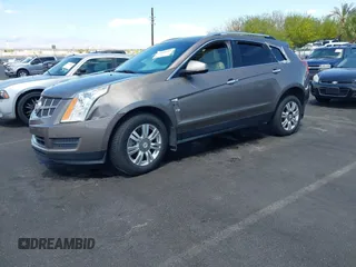 2012 Cadillac SRX Luxury Collection with VIN 3GYFNAE30CS612453, listed as a IAAI auction lot 42048235 with 173,982 mi miles and . Bid and sale history available at carsss.com. Image 2.