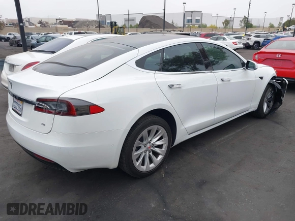 2017 Tesla Model S 60 with VIN 5YJSA1E19HF189578, listed as a IAAI auction lot 42374977 with 40,844 mi miles and . Bid and sale history available at DreamBid. Image 4.