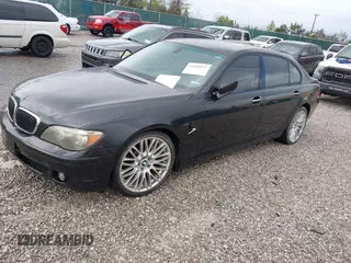 2007 BMW 7 Series 750Li with VIN WBAHN83577DT77290, listed as a IAAI auction lot 41908957 with 164,215 mi miles. Bid and sale history available at carsss.com. Image 2.