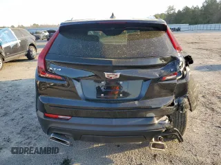 2023 Cadillac XT4 FWD Luxury with VIN 1GYAZAR49PF102307, listed as a Copart auction lot 49342465 with 21,093 mi miles and Salvage Title. Bid and sale history available at DreamBid. Image 6.