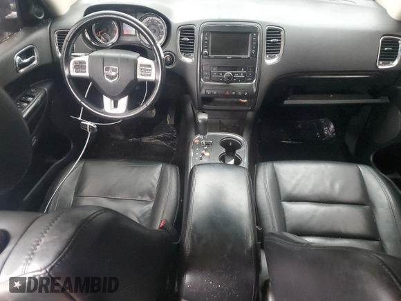 2013 Dodge Durango Crew with VIN 1C4SDJDT9DC538529, listed as a Copart auction lot 88201115 with 142,753 mi miles and Salvage title. Bid and sale history available at DreamBid. Image 8.