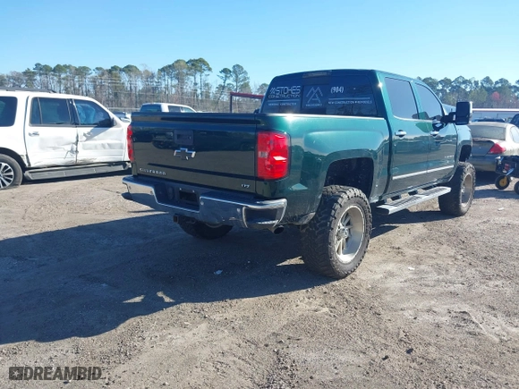 2015 Chevrolet Silverado 1500 LTZ with VIN 3GCUKSEC1FG173590, listed as a IAAI auction lot 41700436 with 117,102 mi miles. Bid and sale history available at carsss.com. Image 4.