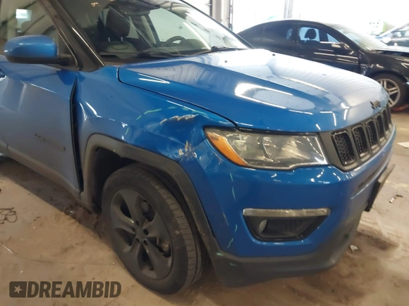 2019 Jeep Compass Latitude with VIN 3C4NJDBB7KT741048, listed as a IAAI auction lot 41597839 with 59,431 mi miles and . Bid and sale history available at DreamBid. Image 19.