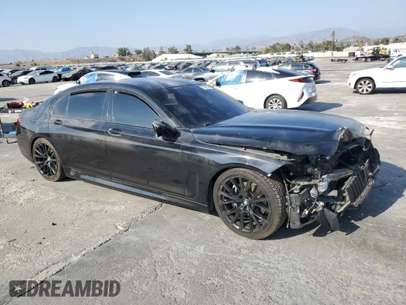 2022 BMW 7 Series 740i with VIN WBA7T2C06NCK50861, listed as a Copart auction lot 71608154 with 51,919 mi miles and Salvage Title. Bid and sale history available at carsss.com. Image 4.